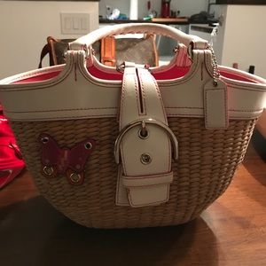 Coach straw purse with white leather trim